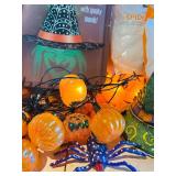 LL - Halloween Decor Lot with Witch Hat Door Decor, Spider Webs, Pumpkin Lights, and Accessories