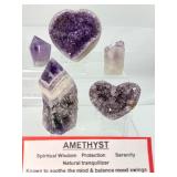 Amethyst lot including a 297 gm/10.4 oz. heart, a 131 gm/4.6 oz. heart, 296 gm/10.4 oz. rough Chevron tower, 125 gm/4.4 oz amethyst core and a 61 gm/2.2 oz polished point