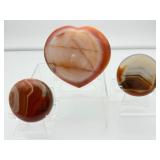 Polychrome Jasper Polished lot of 3: heart 340 gm./12 oz., round palmstone 185 gm./6.5 oz., round palmstone 116 gm./4.1 oz.