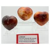 Carnelian Lot of 3 polished hearts: large puffy heart 263 gm./9.3 oz., darker heart 158 gm./4.2 oz., heart 149 gm./5.3 oz.