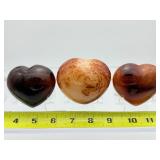Carnelian Lot of 3 polished hearts: large puffy heart 263 gm./9.3 oz., darker heart 158 gm./4.2 oz., heart 149 gm./5.3 oz.