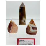 Carnelian 3-piece polished lot: obelisk 267 gm/9.4 oz., banded flames 182 gm./6.4 oz., 122 gm./4.3 oz.