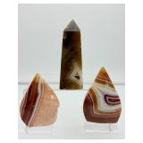 Carnelian 3-piece polished lot: obelisk 267 gm/9.4 oz., banded flames 182 gm./6.4 oz., 122 gm./4.3 oz.