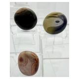 Polychrome Jasper Polished Sphere/Palmstone Lot of 5: sphere 58mm 309gm/11oz., sphere 53mm 245gm/8.5oz., 3 palmstones 91gm/3.2oz.