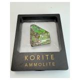 Ammolite Gem Specimen from the KORITE Ammolite Mine, Alberta, Canada in box with certificate of authenticity, 3 color specimen (purple, blue & green) 14 gm./.5 oz
