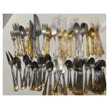 Large Mixed Set of Gold and Silver Tone Flatware Utensils