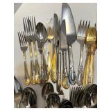 Large Mixed Set of Gold and Silver Tone Flatware Utensils