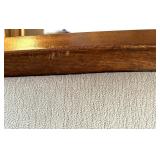 Antique Wood-Trimmed Sofa with Carved Paw Feet and Accent Pillows