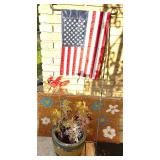 Outdoor Decor Lot with Doormat, Flag Stand, Planter, and Garden Spinner