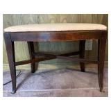 Upholstered Wood Bench with Curved Seat and Cross Bracing