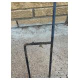 Outdoor Decor Lot with Doormat, Flag Stand, Planter, and Garden Spinner