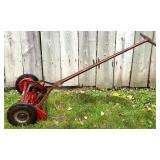 Vintage Craftsman Reel Lawn Mower, Wood Outdoor Lounger, and Metal Snow Shovel