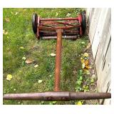 Vintage Craftsman Reel Lawn Mower, Wood Outdoor Lounger, and Metal Snow Shovel