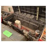 Black Plastic Toolbox With Assorted Tools and Accessories