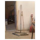 Three Concrete Rakes with Wooden Handles