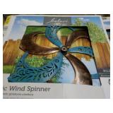 2 Kinetic Wind Spinners...