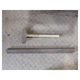 Sledge Hammer and Iron Pounding Pipe