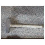 Sledge Hammer and Iron Pounding Pipe