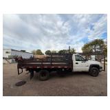 2007 White Chevy 3500 Diesel truck, flatbed with side rails, rack extending over the cab