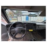 2007 White Chevy 3500 Diesel truck, flatbed with side rails, rack extending over the cab