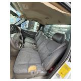 2007 White Chevy 3500 Diesel truck, flatbed with side rails, rack extending over the cab