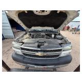 2007 White Chevy 3500 Diesel truck, flatbed with side rails, rack extending over the cab