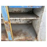 Metal workbench or tool cabinet with 2 drawers and 2 lower cabinet doors.