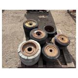 Pallet of (11) Industrial tires and rims, likely for heavy yard equipment