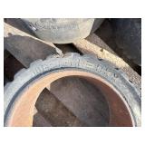 Pallet of (11) Industrial tires and rims, likely for heavy yard equipment