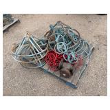 Pallet of valve hand wheels and protective frames. One valve body.