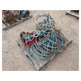 Pallet of valve hand wheels and protective frames. One valve body.