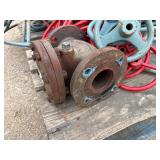 Pallet of valve hand wheels and protective frames. One valve body.