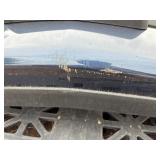 Vehicle Front Bumper Assembly w/ fog light openings, license plate mounting bracket and two-tone color scheme.