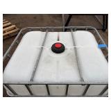 Plastic tank inside a Protect Plus PG50 metal cage. L 39 ½” x W 47” x H 46”