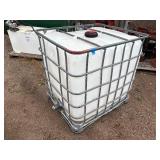 Plastic tank inside a metal cage. L 39 ½” x W 47” x H 46”