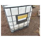 Plastic tank inside a metal cage. L 39 ½” x W 47” x H 46”