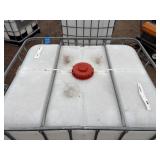 Plastic tank inside a metal cage L 39 ½” x W 47” x H 46”