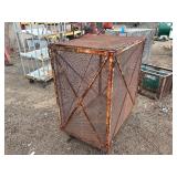 Steel mesh security cage on casters for easy mobility and forklift attachment rack