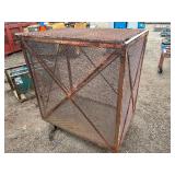 Steel mesh security cage on casters for easy mobility and forklift attachment rack