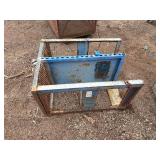 Steel mesh security cage on casters for easy mobility and forklift attachment rack