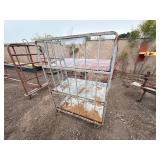 Metal rolling storage cart or cage with two fixed shelves 70” x 48”