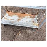 Metal rolling storage cart or cage with two fixed shelves 70” x 48”