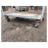 Metal rolling storage cart or cage with two fixed shelves 70” x 48”