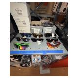 Sunglasses, approximately 1,100. Note: All merchandise is new