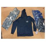 5 shelves of mostly Minnesota shirts, sweatshirts & jackets