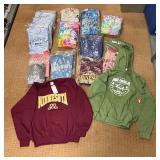 5 shelves of mostly Minnesota shirts, sweatshirts & jackets