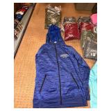 5 shelves of MN, WI, Iowa apparel various sizes designs & colors