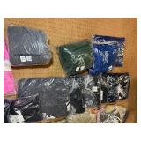 5 shelves of MN, WI, Iowa apparel various sizes designs & colors