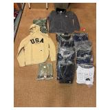 5 shelves of apparel: jackets, hoodies, sweatshirts