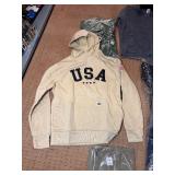 5 shelves of apparel: jackets, hoodies, sweatshirts